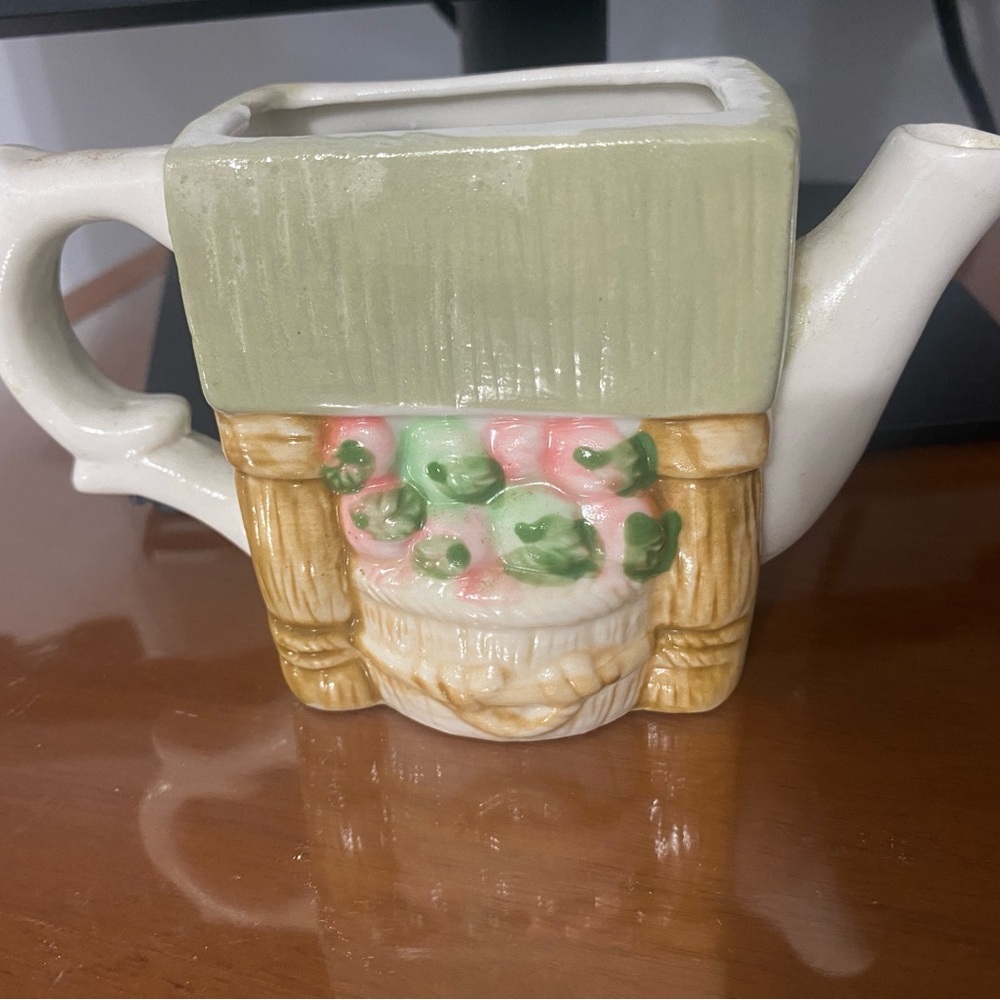Artistic Ceramic Teapot with Floral Accents